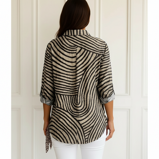 Ingrid: Blusa de rayas en espiral, estilo chic y versátil