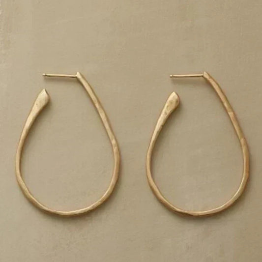 Pendientes de aro dorados vintage: elegancia atemporal