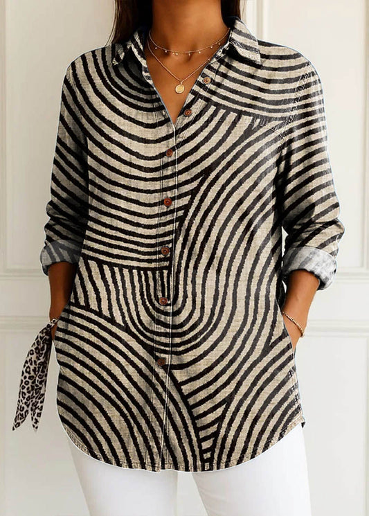 Ingrid: Blusa de rayas en espiral, estilo chic y versátil